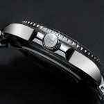 elysian-zilveren-heren-horloge-42mm-blauw-plaat-zilver-schakelband-horlogeband-ELYWM11041-crown