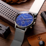 elysian-zilveren-heren-horloge-blauw-plaat-zilver-mesh-horlogeband-ELYWM01031-scene