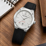 Elysian Octa White - Black Rubber, op een houten bureau